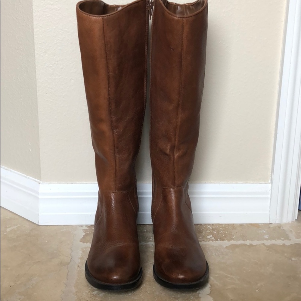 Tall brown leather boots